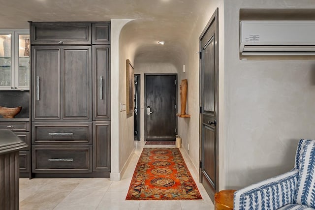 12 S Kihei Rd Unit E2, Kihei, HI 96753 - hall with a wall unit AC and light tile patterned floors