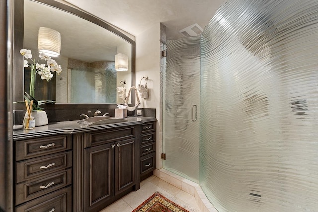 12 S Kihei Rd Unit E2, Kihei, HI 96753 - full bathroom featuring tile patterned floors, vanity, and a stall shower