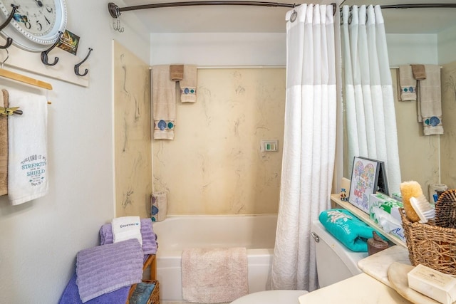 bathroom with toilet and shower / bath combo with shower curtain