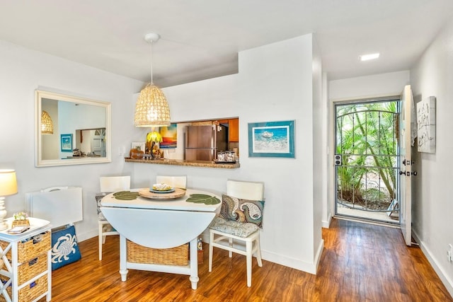 dining room featuring dark hardwood / wood-style floors