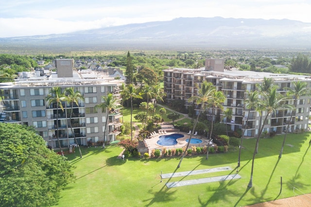 drone / aerial view featuring a mountain view