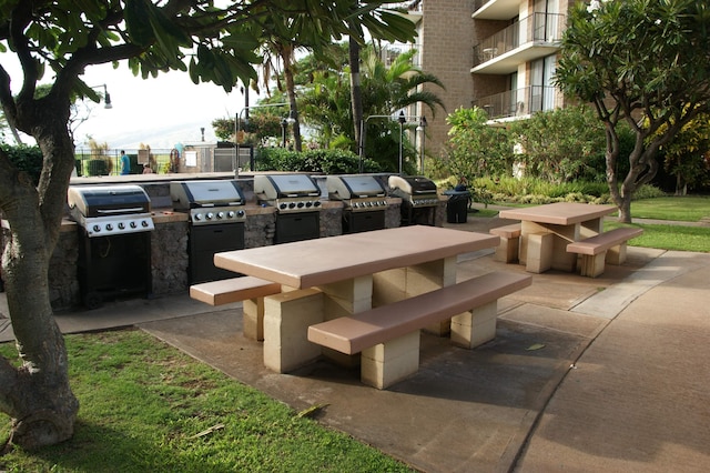 view of patio / terrace with an outdoor kitchen and grilling area