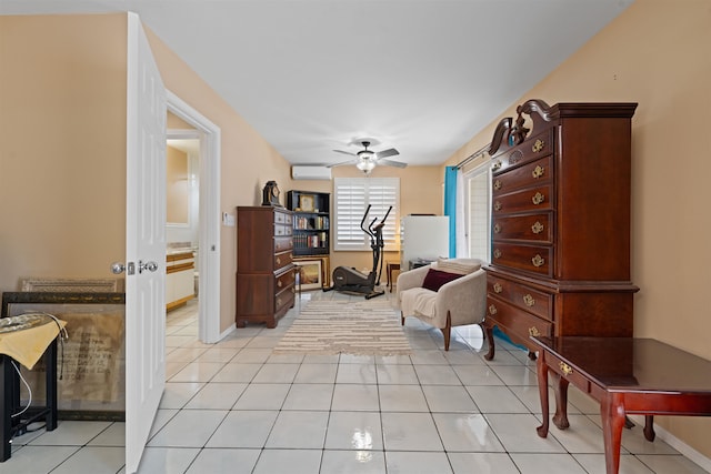 living area featuring ceiling fan, light tile patterned floors, and a wall mounted AC