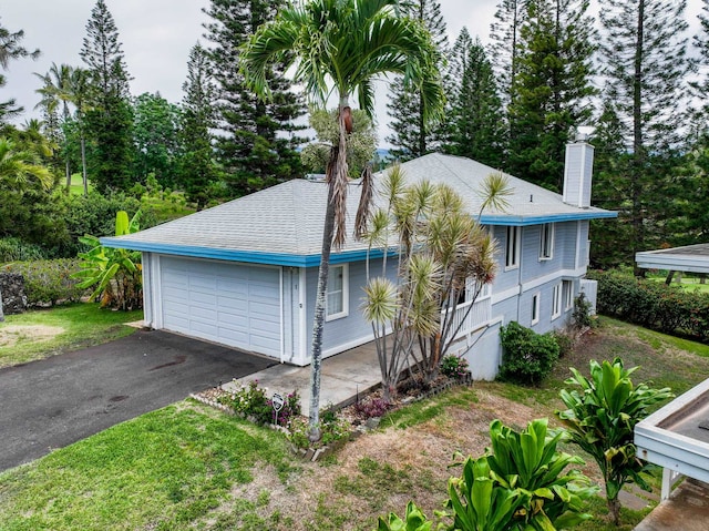 view of front of house with a garage