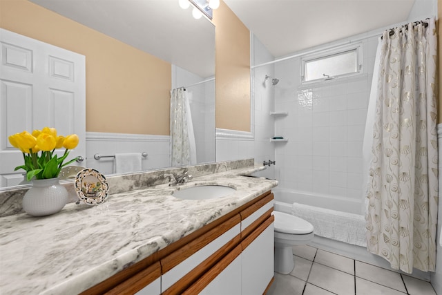 full bathroom with shower / tub combo with curtain, tile patterned flooring, vanity, and toilet