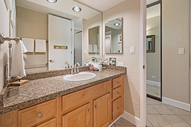 bathroom featuring vanity and tile patterned floors