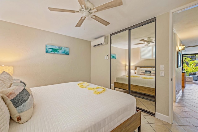 tiled bedroom featuring ceiling fan, a wall mounted AC, and a closet