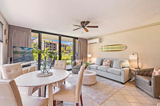 tiled dining room with an AC wall unit, ceiling fan, a wealth of natural light, and floor to ceiling windows