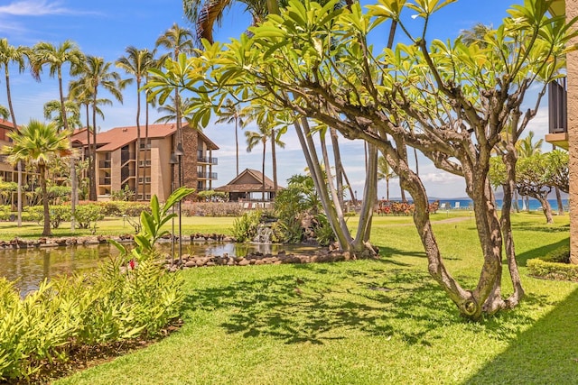 view of yard featuring a water view