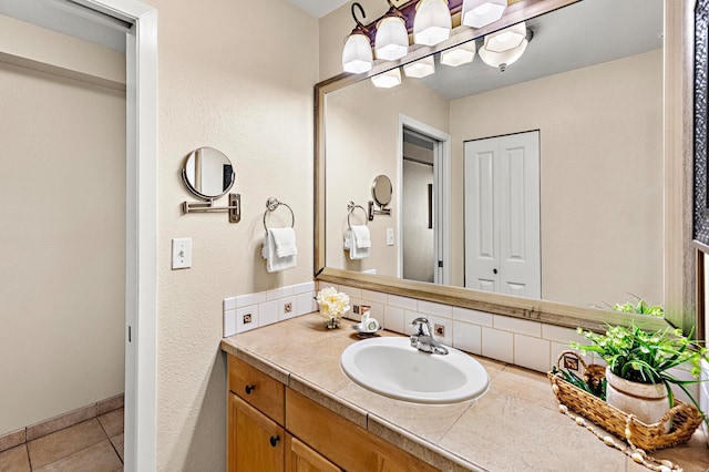 bathroom featuring vanity and tile patterned flooring