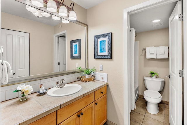 full bathroom with shower / bath combination with curtain, backsplash, vanity, tile patterned flooring, and toilet