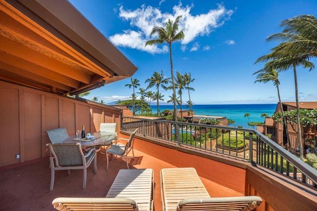 balcony featuring a water view