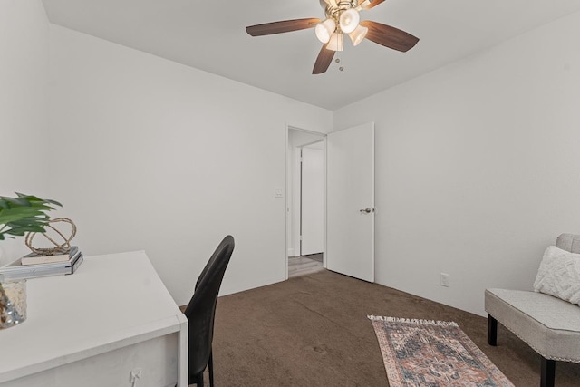 office featuring dark carpet and ceiling fan