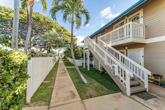 view of side of property with a patio