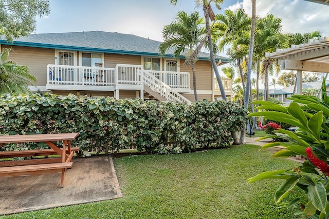 exterior space featuring a deck and a pergola