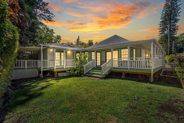 3217 Luahine Pl, Haiku, HI 96708 - rear view of house featuring a yard and covered porch