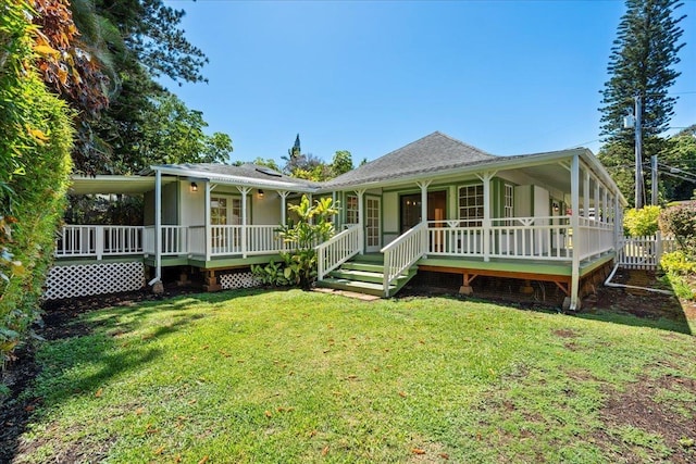 3217 Luahine Pl, Haiku, HI 96708 - rear view of property with a porch and a lawn