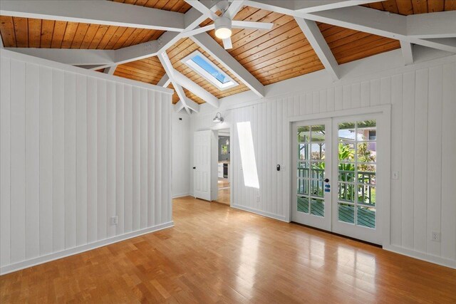 3217 Luahine Pl, Haiku, HI 96708 - unfurnished room featuring a skylight, ceiling fan, french doors, wood finished floors, and wooden ceiling