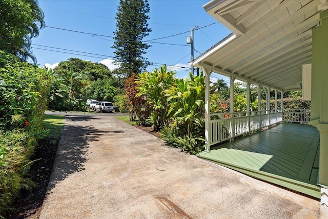 3217 Luahine Pl, Haiku, HI 96708 - view of patio / terrace featuring driveway and covered porch