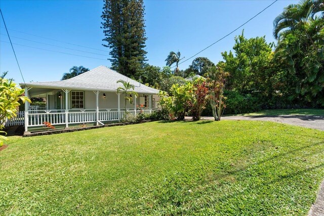 3217 Luahine Pl, Haiku, HI 96708 - view of grassy yard with covered porch