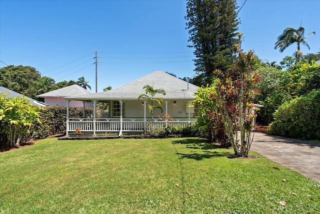 3217 Luahine Pl, Haiku, HI 96708 - view of front of property featuring covered porch, a front yard, and driveway