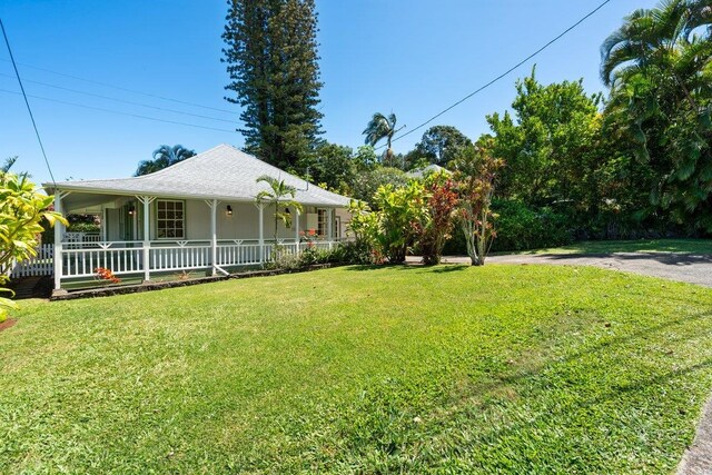 3217 Luahine Pl, Haiku, HI 96708 - view of grassy yard featuring covered porch