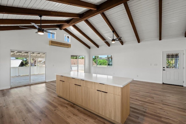 402 Auhana Rd, Kihei, HI 96753 - kitchen with a ceiling fan, light brown cabinetry, modern cabinets, high vaulted ceiling, and beam ceiling