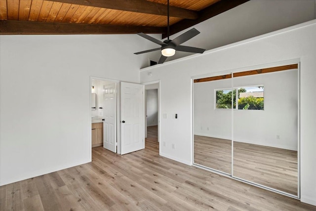402 Auhana Rd, Kihei, HI 96753 - unfurnished bedroom with wood ceiling, wood finished floors, a closet, connected bathroom, and ceiling fan