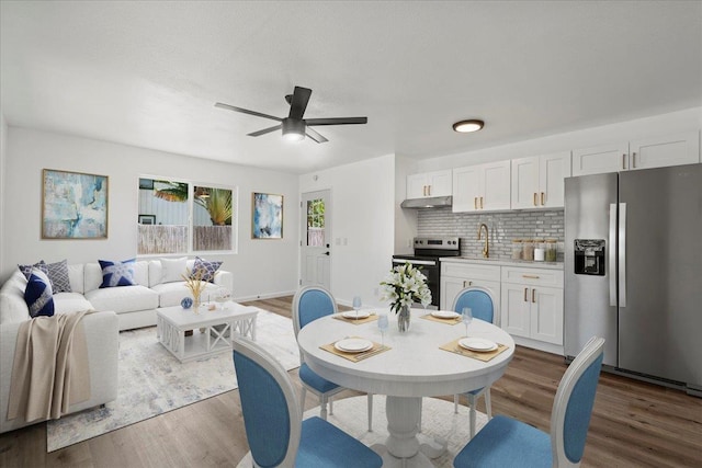 402 Auhana Rd, Kihei, HI 96753 - dining space with wood finished floors and ceiling fan