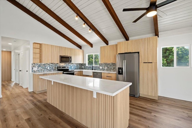 402 Auhana Rd, Kihei, HI 96753 - kitchen featuring stainless steel appliances, modern cabinets, light brown cabinetry, light countertops, and a wooden ceiling with exposed beams