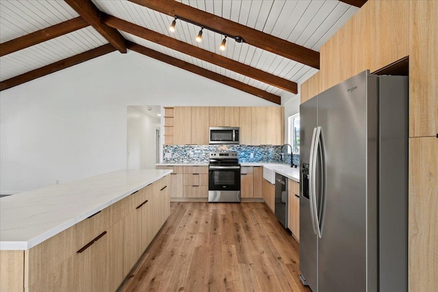 402 Auhana Rd, Kihei, HI 96753 - kitchen with stainless steel appliances, light brown cabinets, modern cabinets, light wood-style floors, and light stone counters