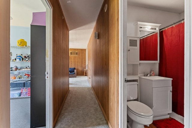 119 Kupalaiki Loop, Kihei, HI 96753 - full bath with toilet, wooden walls, vanity, a shower with shower curtain, and baseboards