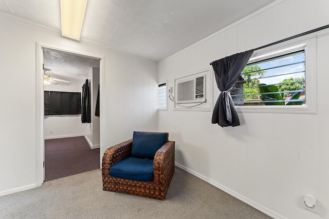 119 Kupalaiki Loop, Kihei, HI 96753 - living area with carpet flooring, plenty of natural light, a textured ceiling, and baseboards