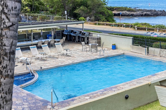 2075 S Kihei Rd Unit 214, Kihei, HI 96753 - community pool featuring a water view and a patio area