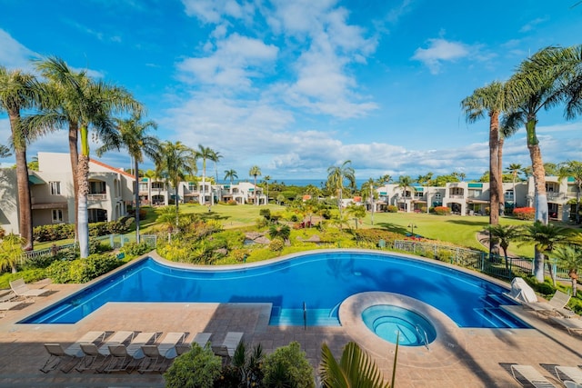 3200 Wailea Alanui Dr Unit 1606, Kihei, HI 96753 - view of pool featuring a residential view and a pool with connected hot tub