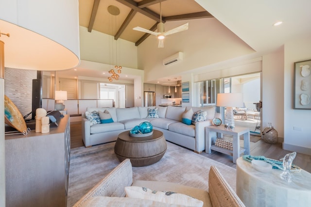 3200 Wailea Alanui Dr Unit 1606, Kihei, HI 96753 - living area featuring a wall mounted air conditioner, wood finished floors, ceiling fan, beam ceiling, and high vaulted ceiling
