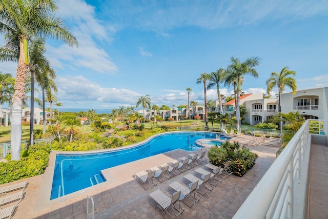 3200 Wailea Alanui Dr Unit 1606, Kihei, HI 96753 - view of swimming pool featuring a patio area, a residential view, and a pool with connected hot tub