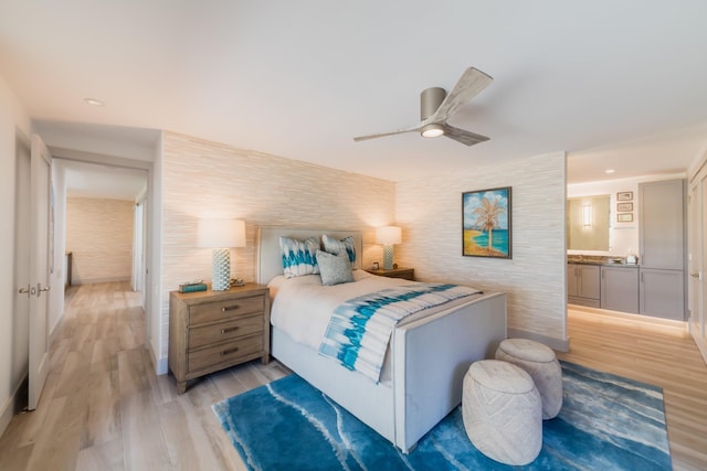 3200 Wailea Alanui Dr Unit 1606, Kihei, HI 96753 - bedroom with light wood finished floors, ceiling fan, and recessed lighting