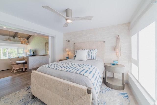 3200 Wailea Alanui Dr Unit 1606, Kihei, HI 96753 - bedroom featuring wood finished floors, beam ceiling, and ceiling fan