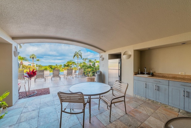 3200 Wailea Alanui Dr Unit 1606, Kihei, HI 96753 - view of patio / terrace with exterior kitchen and outdoor dining space