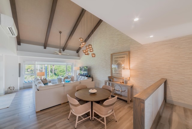3200 Wailea Alanui Dr Unit 1606, Kihei, HI 96753 - dining area featuring wallpapered walls, a wall mounted air conditioner, light wood finished floors, an accent wall, and ceiling fan