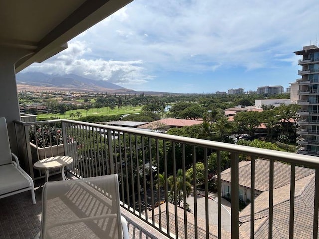 balcony featuring a mountain view