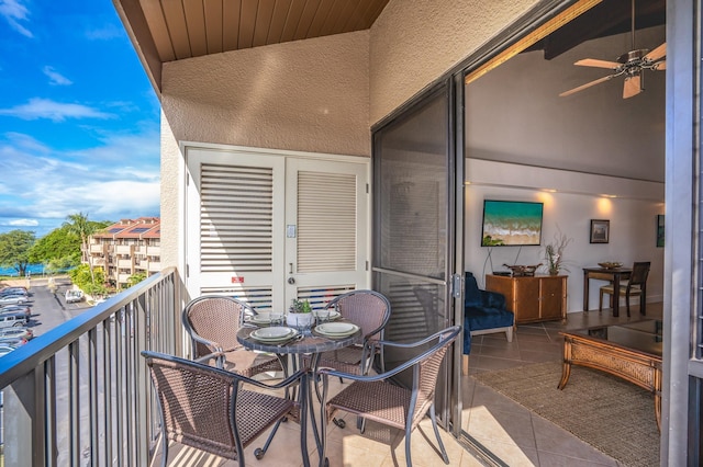 balcony featuring ceiling fan