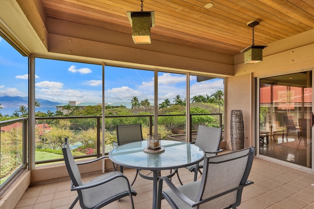 sunroom / solarium with wood ceiling