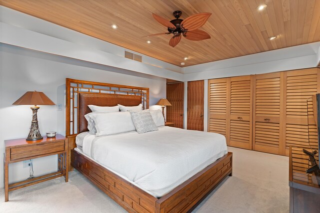 bedroom with carpet flooring, ceiling fan, and wooden ceiling