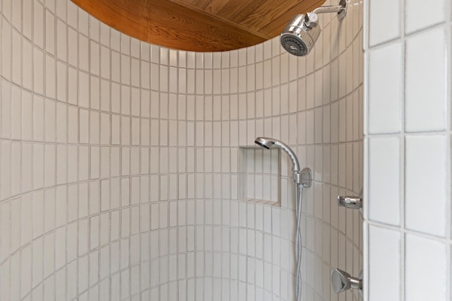 exterior details featuring tiled shower