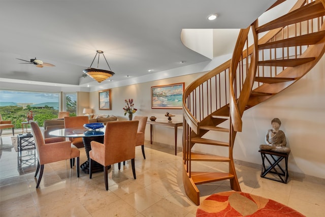 dining space with light tile flooring