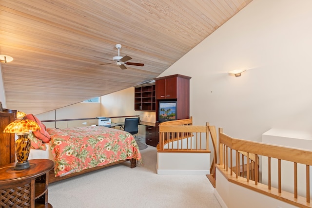 bedroom featuring wooden ceiling, vaulted ceiling, carpet floors, and ceiling fan