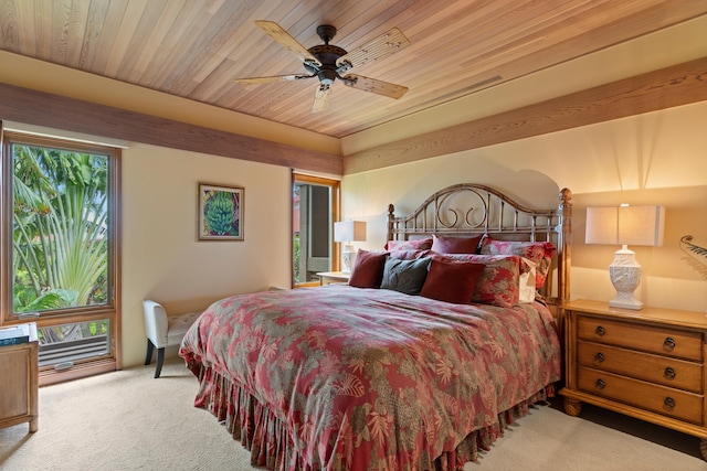 carpeted bedroom featuring ceiling fan and wooden ceiling