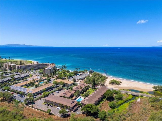 bird's eye view with a view of the beach and a water view